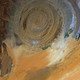 Illustration for article titled The Eye of the Sahara Is An Enigmatic Desert Landmark